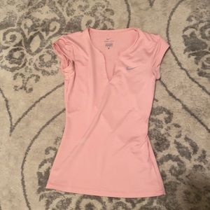 Soft pink Nike compression tee